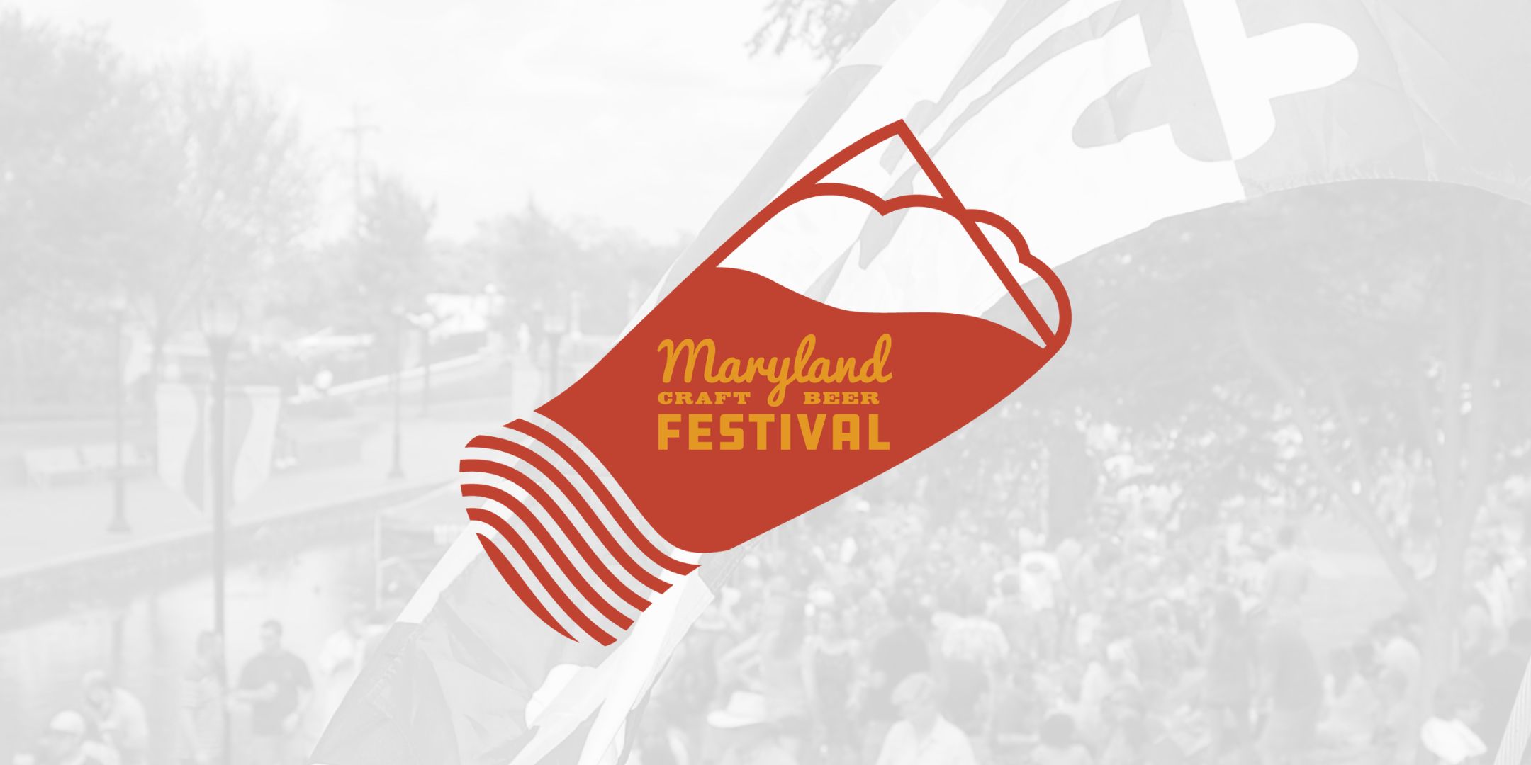 Logo for the Maryland Craft Beer Festival featuring a stylized beer glass filled with a mountain silhouette.